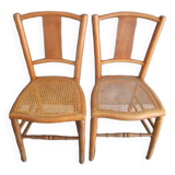 Paire de chaises cannées anciennes en bois blond