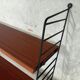 Vintage wall shelf in teak and black metal String Tomado style