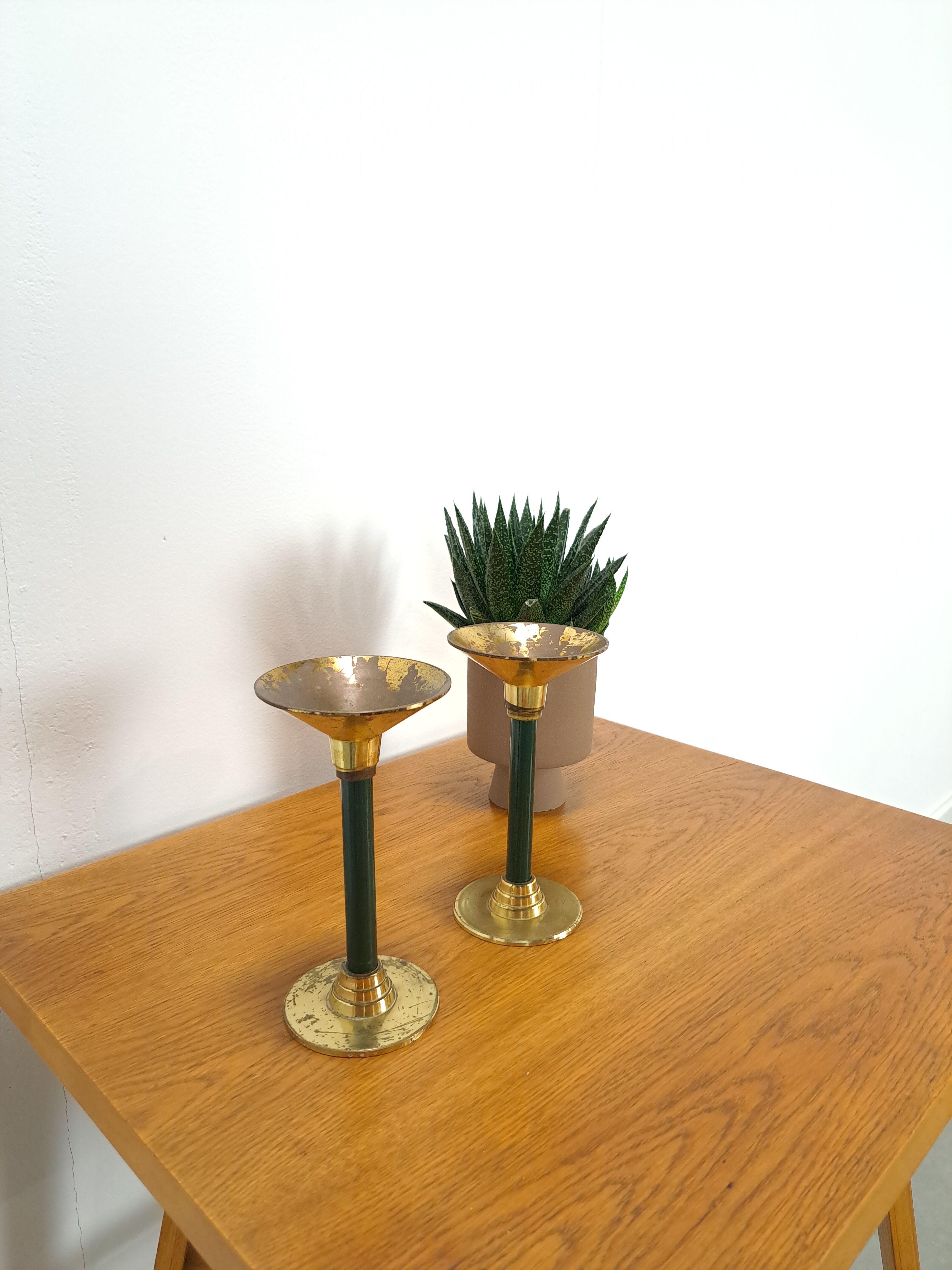 Brass candlesticks with dark green vintage