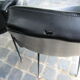2 armchairs in 1972 black leatherette