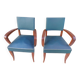 pair of dark green bridge armchairs