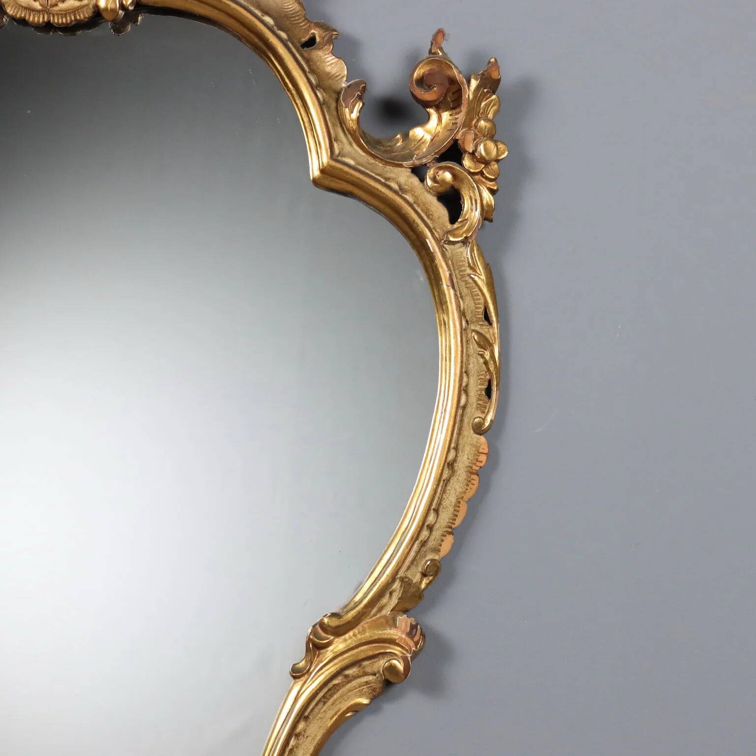 Antique baroque-style mirror in carved wood, Italy, 19th century.