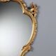 Antique baroque-style mirror in carved wood, Italy, 19th century.