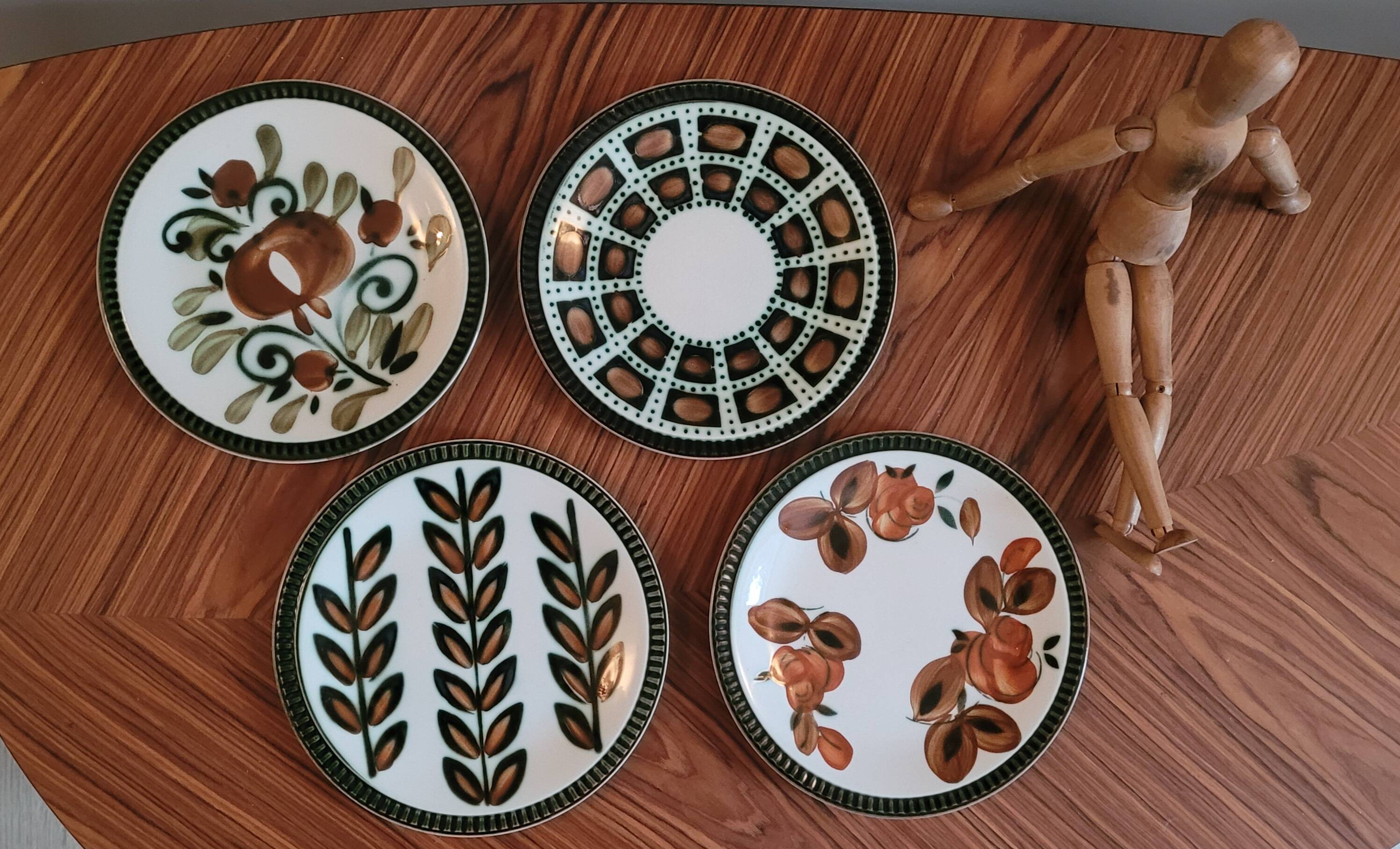 Set of 4 mismatched plates Delta Boch 1966