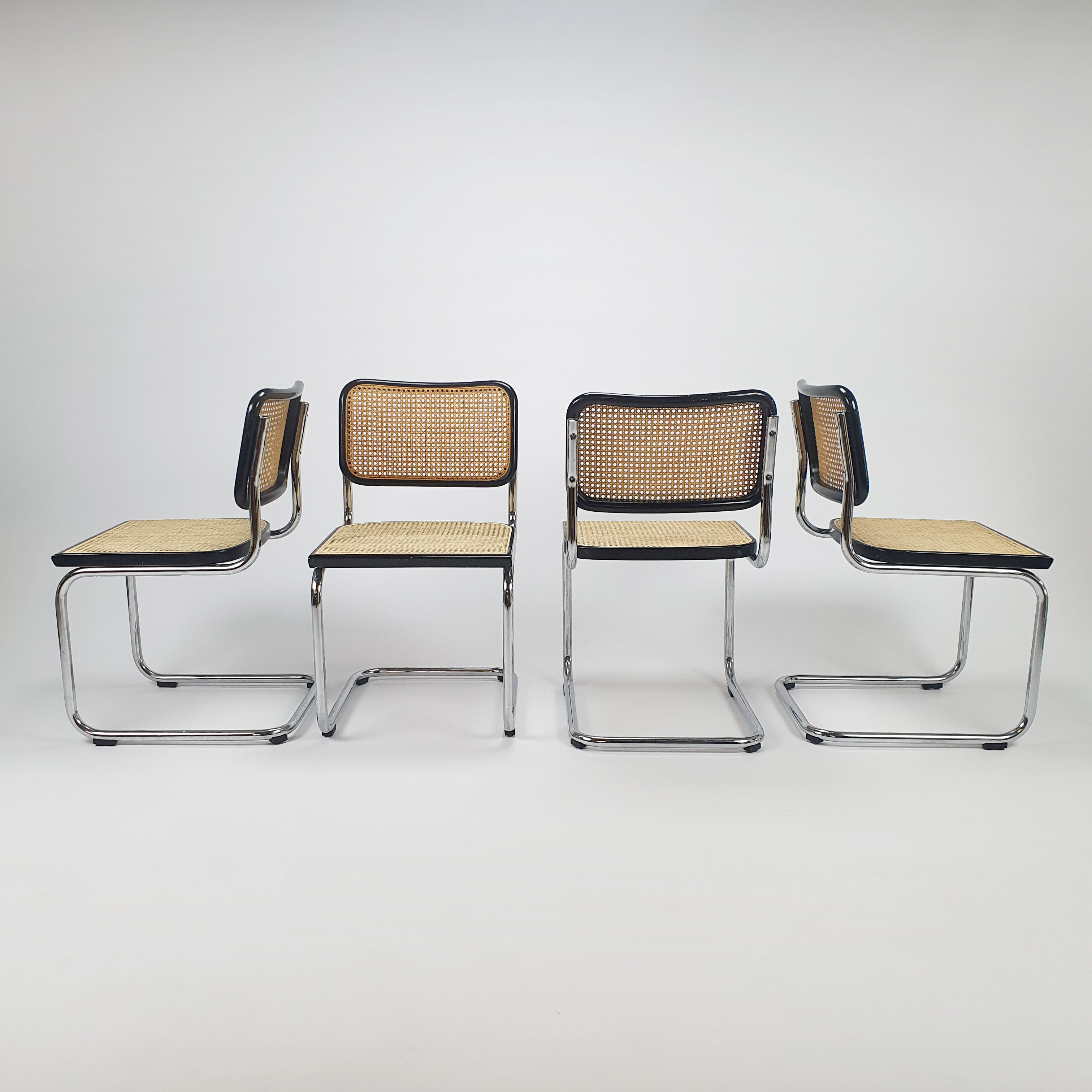 Set of 4 Tubular Frame and Cane Cantilever dining chairs, Italy, 1970s