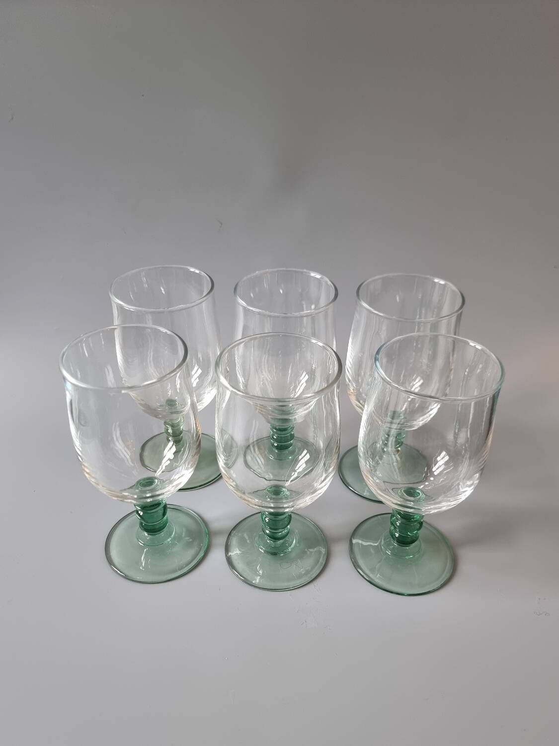 Green stemmed glasses