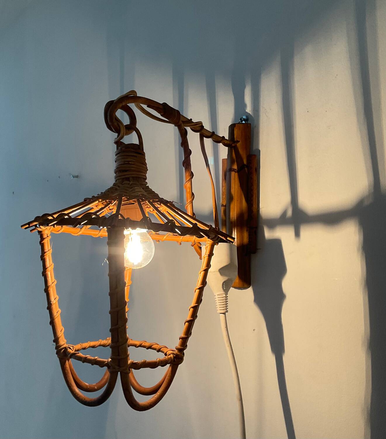 Louis Sognot rattan wall lamp from the 50s and 60s