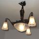 Lustre en fer forgé et verre opalin