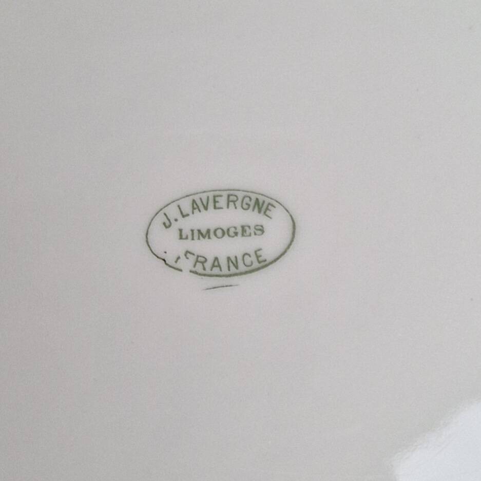 Composition of 6 flat plates in Limoges porcelain: