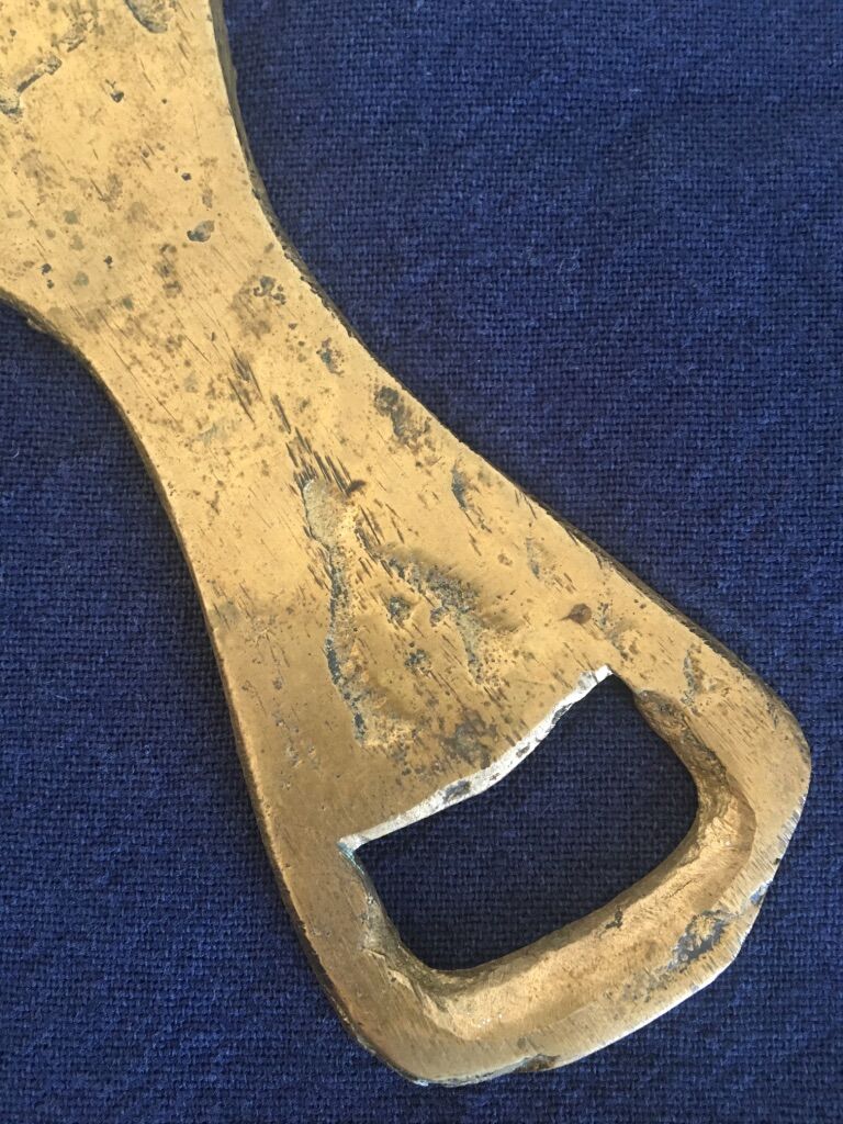 Hand-shaped brass stripper