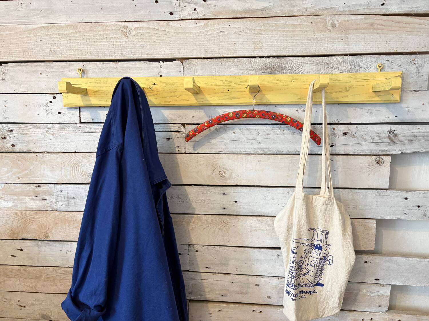 Antique lemon yellow coat hook