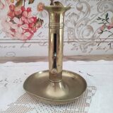 Brass push candle holder on frame