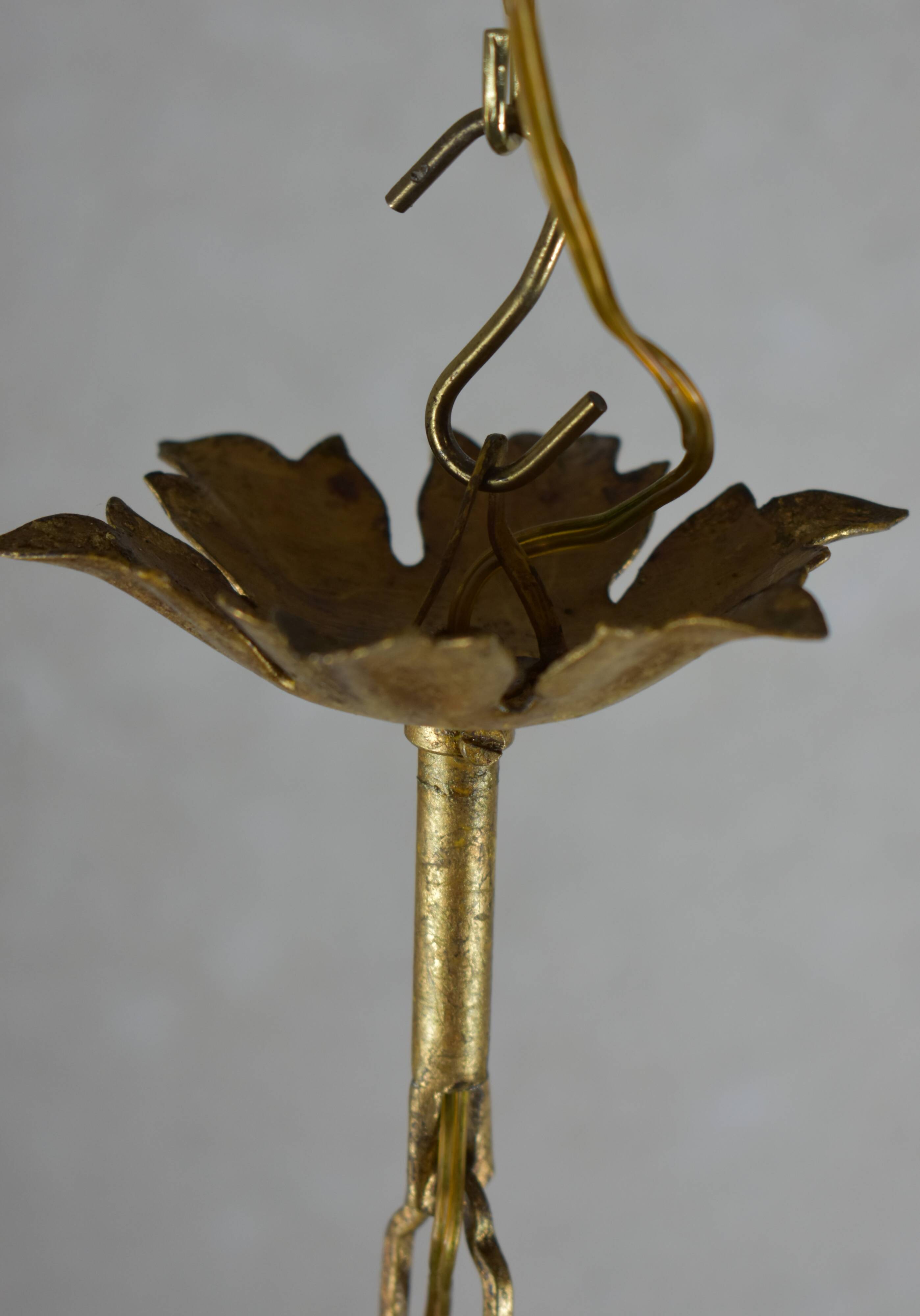 golden chandeliers with flowers.