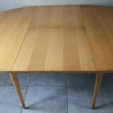 Vintage round table from the 60s with butterfly extension