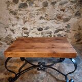 Vintage French coffee table from the 1960s – Rustic pine coffee table with a black iron base.