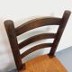 Set of 4 vintage brutalist chairs by Georges Robert in wood and straw.