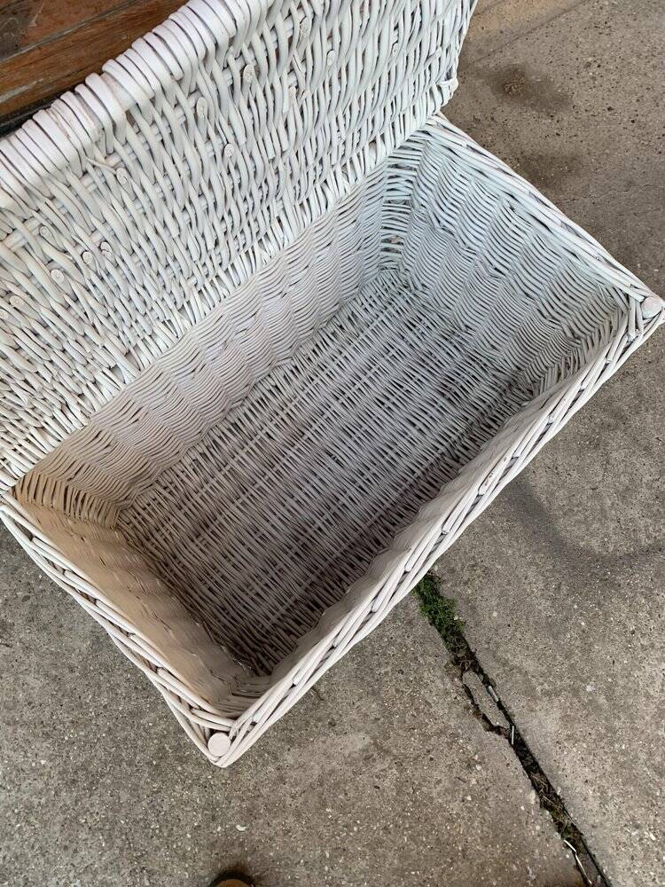 Vintage white wicker chest with double lid and decorative weaving.