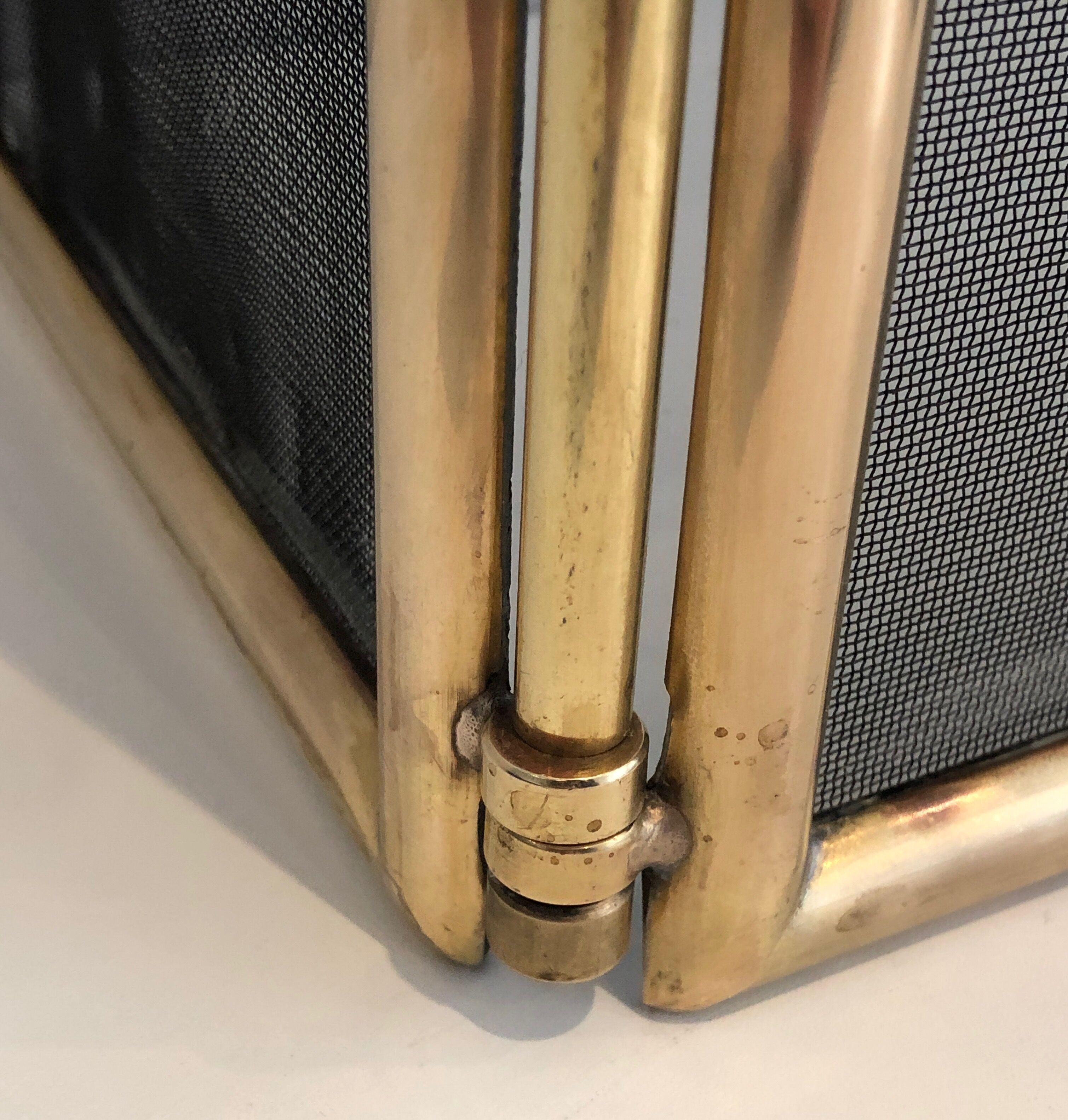 Brass and wire mesh firewall. french work. around 1970