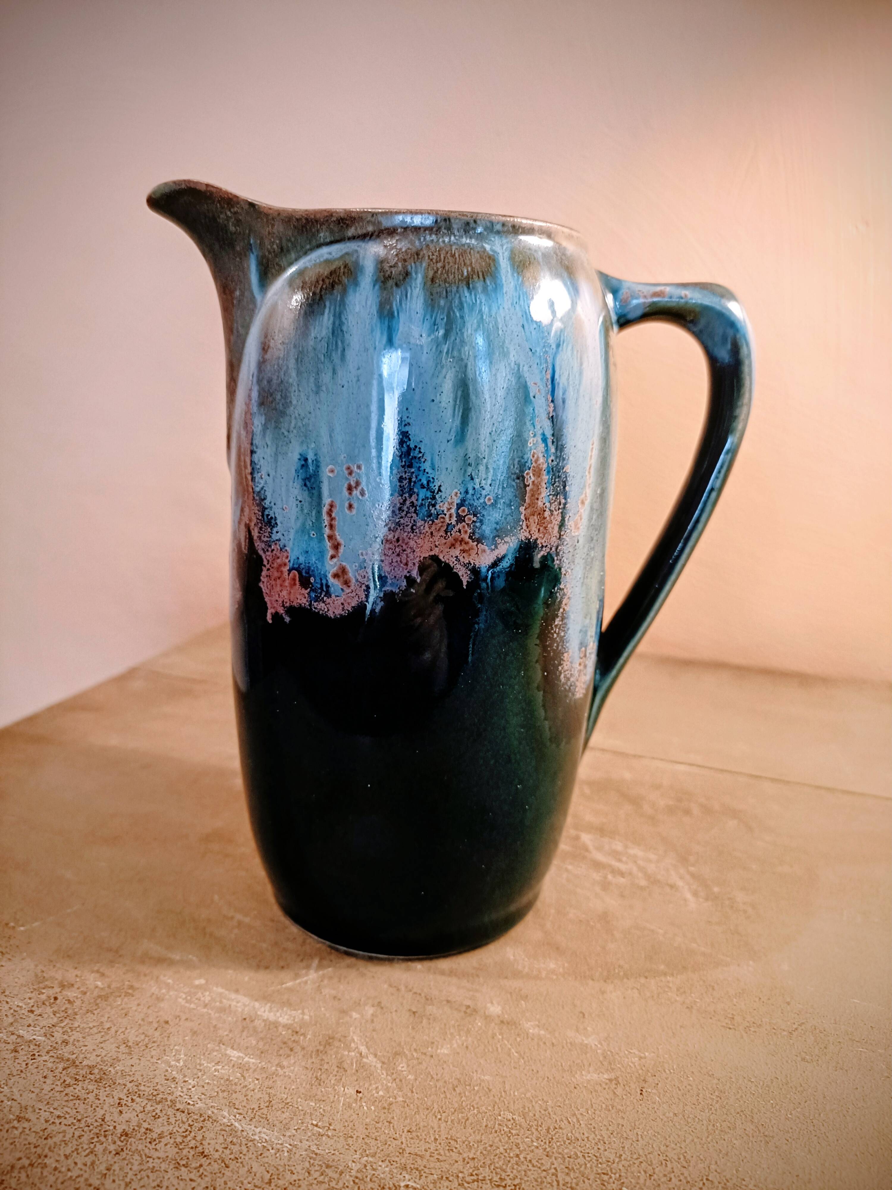 Flamed stoneware pitcher signed Denbac