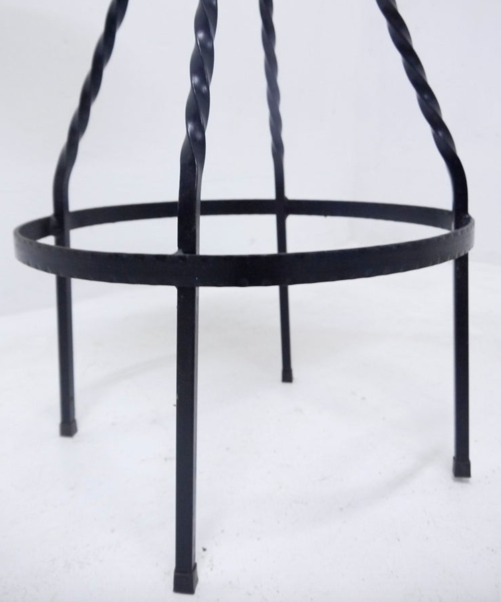 Footswith e.g. wrought iron feet and 60s vinyl seating