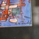 framed painting "red boats" signed