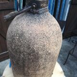 Old bottle covered with liege