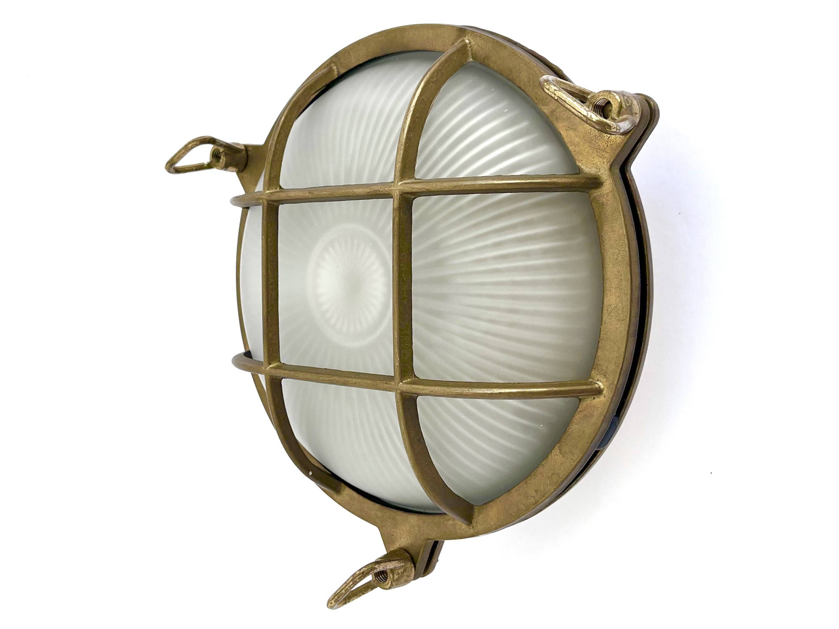 Marine decorative wall light in solid brass