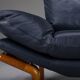 Danish teak and navy blue leather lounge chair from Komfort, 1970s