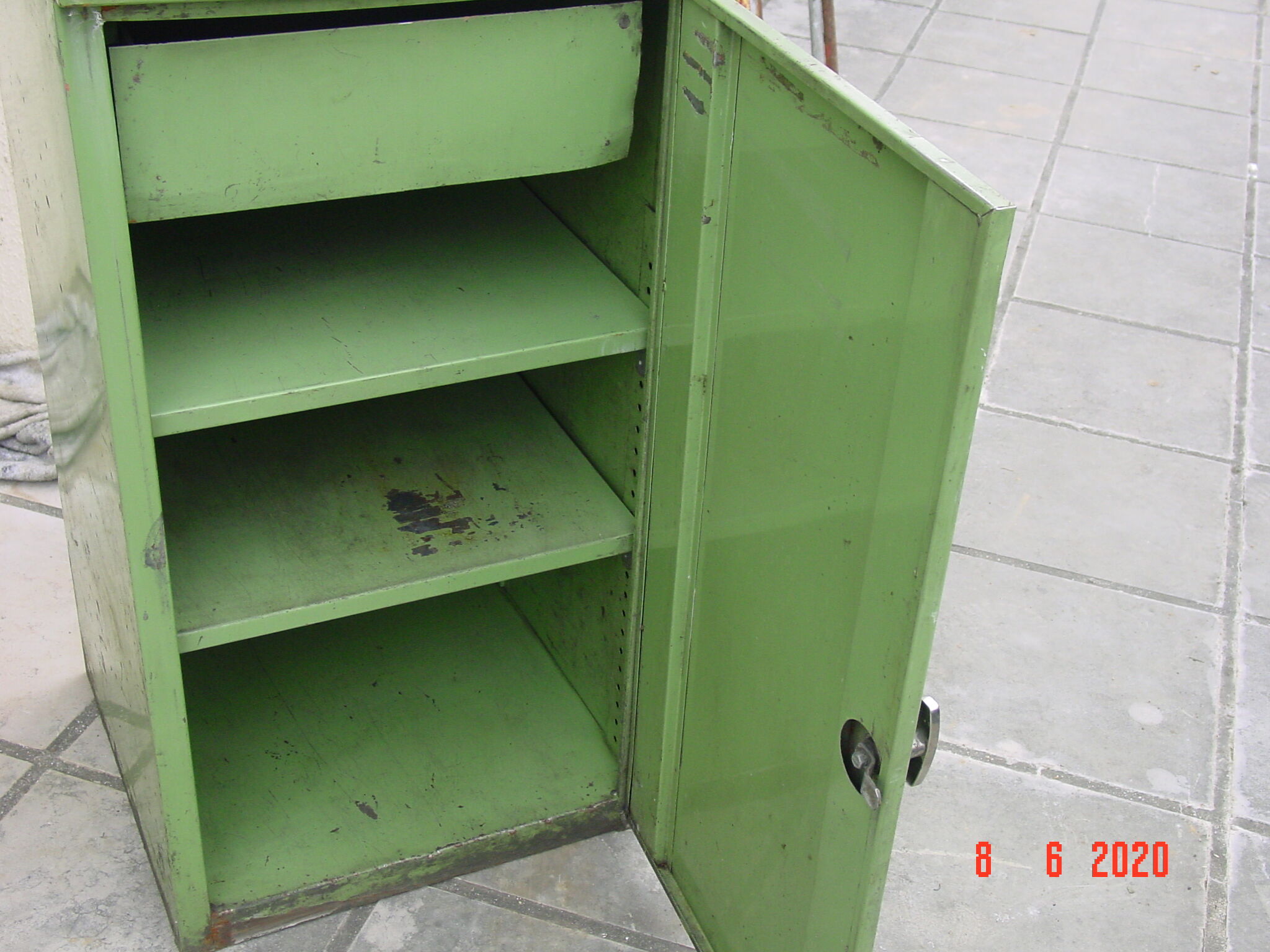 Green industrial metal cabinet