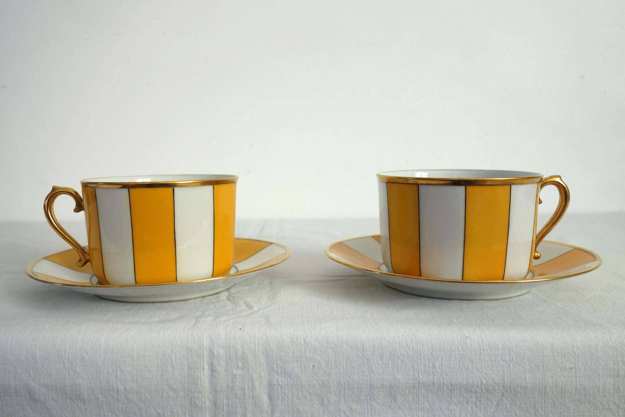2 vintage Limoges porcelain cups with saucers