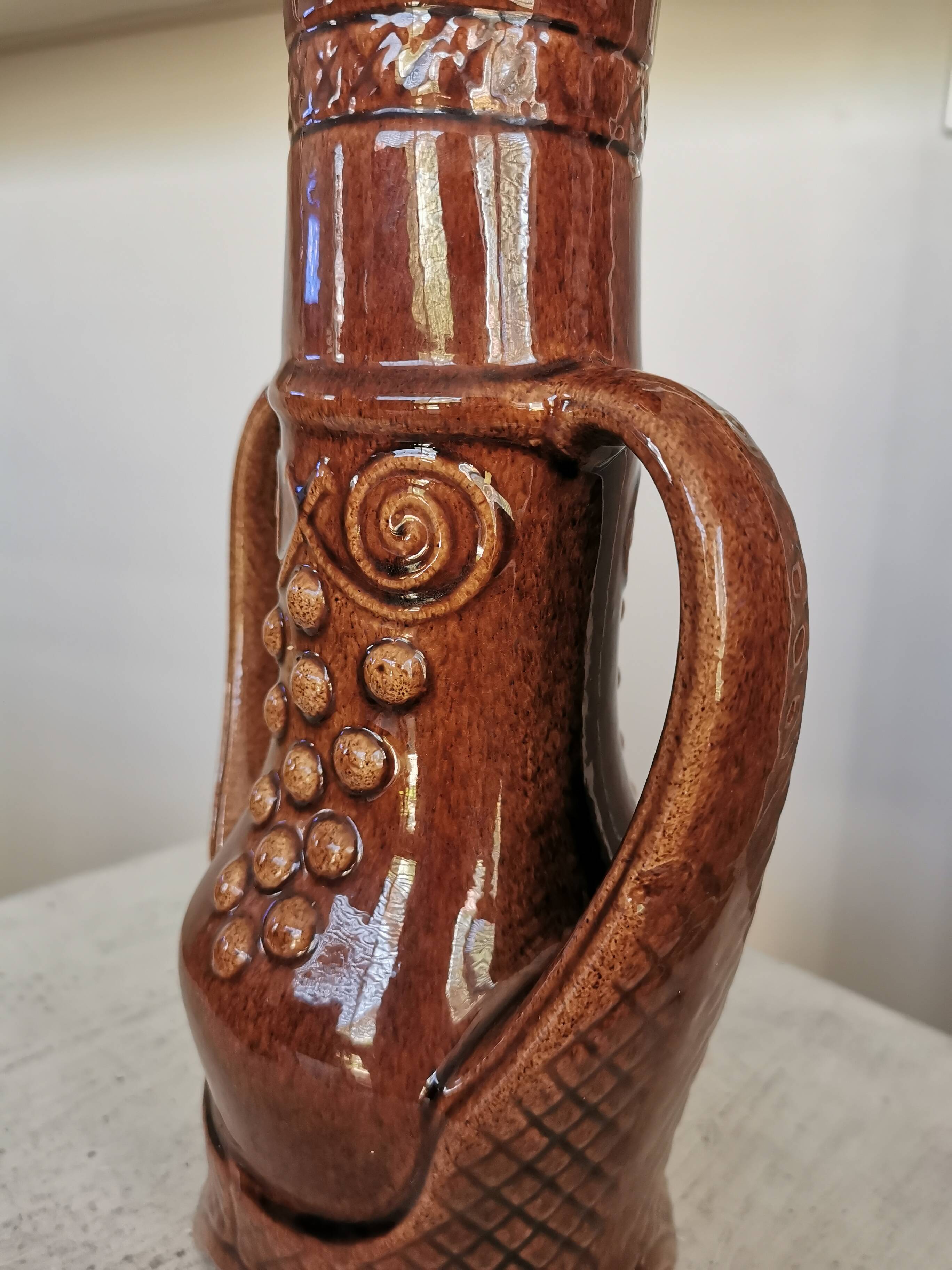Vintage Amphora Vase: Large Brown Glazed Pottery with Grape Motif
