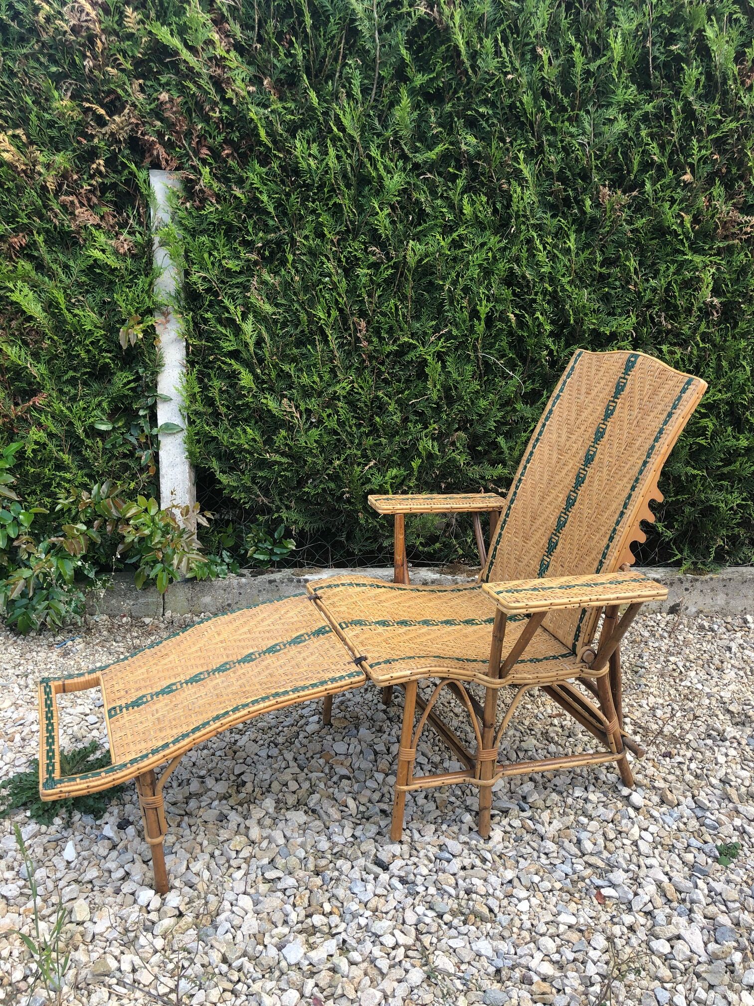 Rattan lounger with foot rest