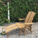 Rattan lounger with foot rest
