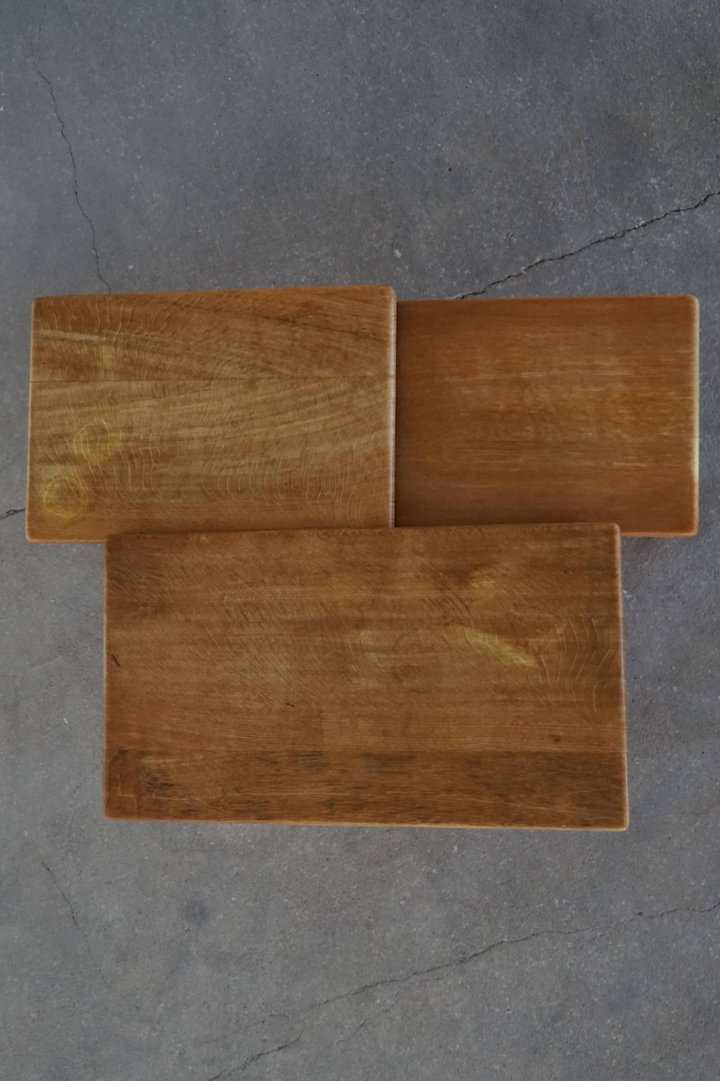 Nesting tables in oak, made by a Danish cabinetmaker, mid-century modern, 1960s.