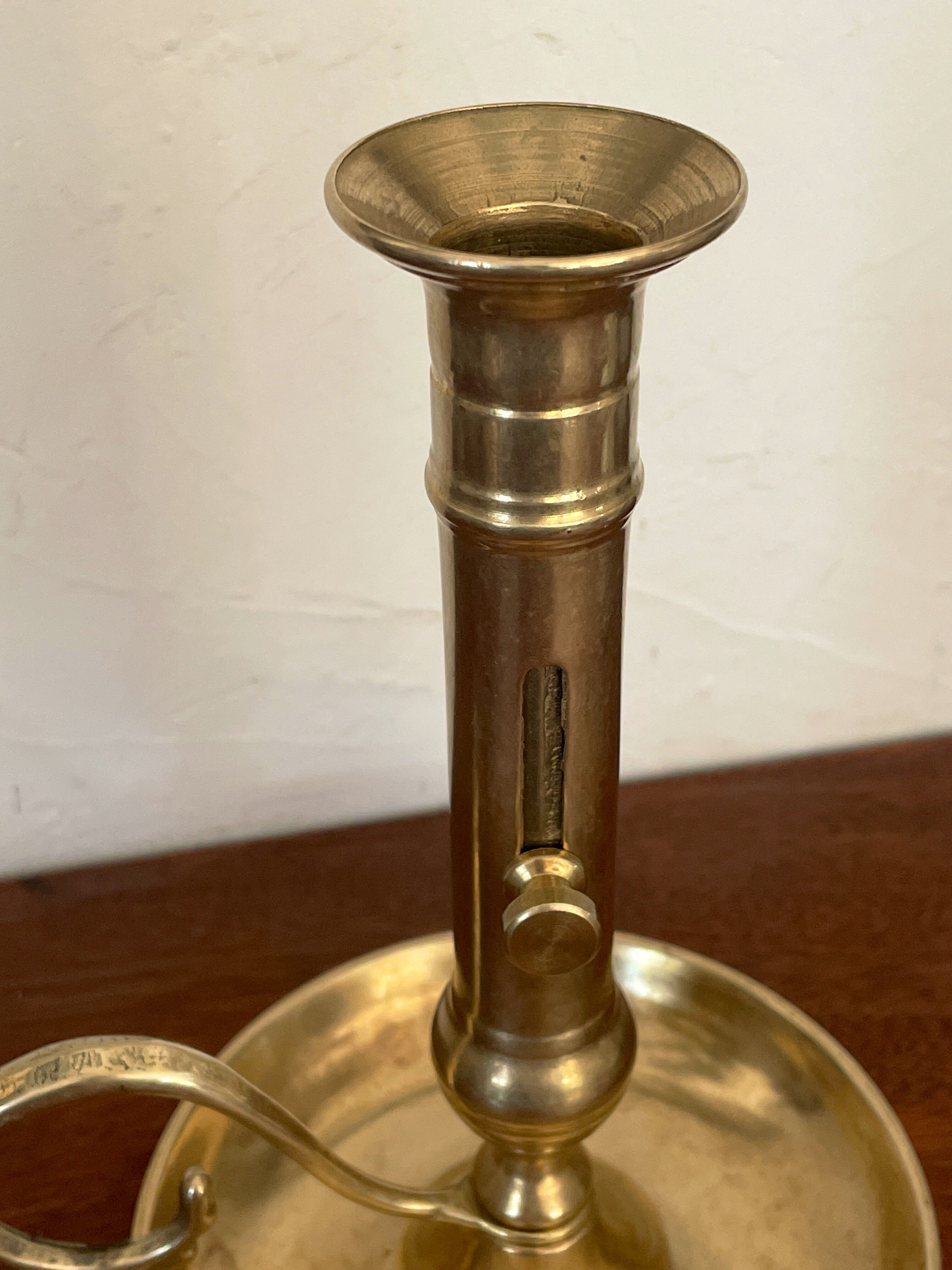 Pair of brass candle holders