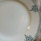 13 mismatched flat plates in ironstone