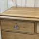 English chest of drawers in nineteenth century fir with its glass buttons