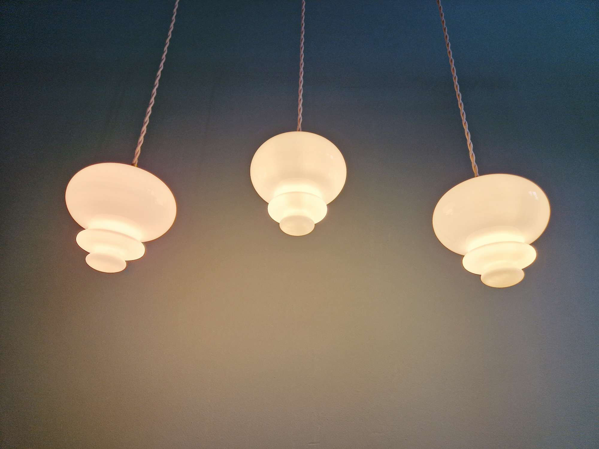 Scandinavian trio of suspensions in white opaline, 1960.