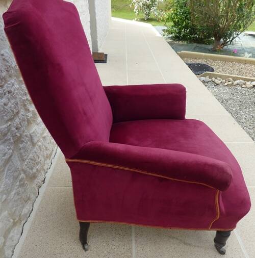Bergère with blackened wooden legs on casters, Napoleon III period, velvet upholstery
