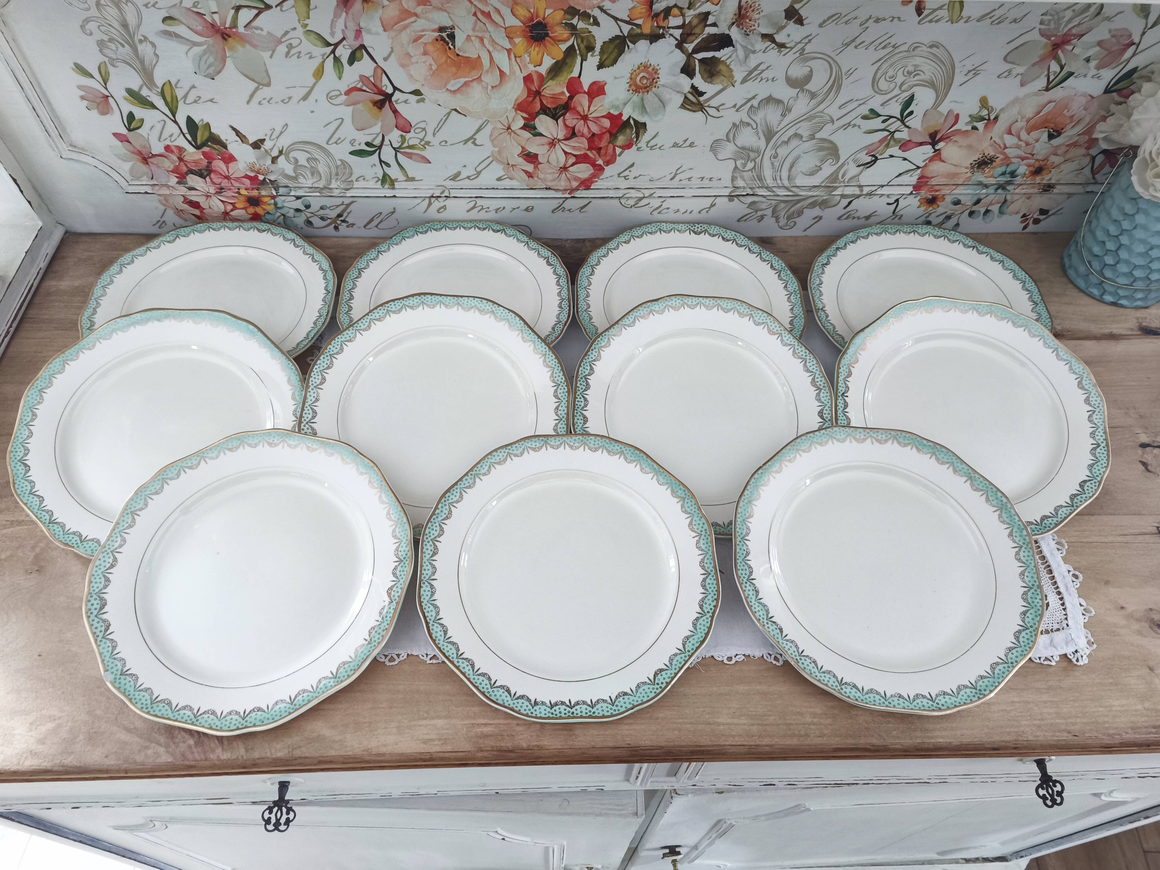 Set of 11 Longwy France earthenware dinner plates, Trianon model