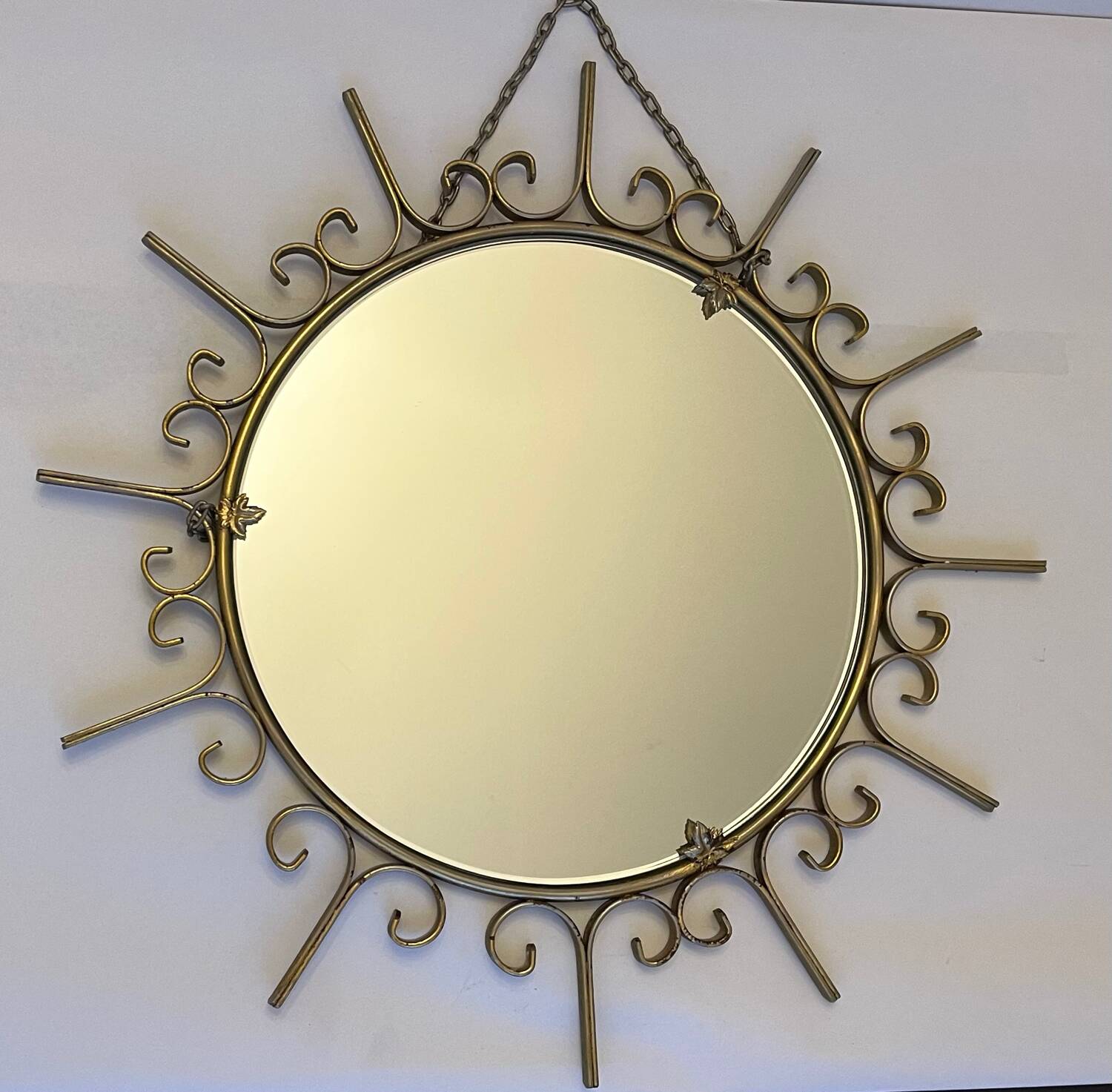 Gold metal sun mirror