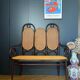 Curved wooden bench with caning, stamped Thonet - model 83 - early.