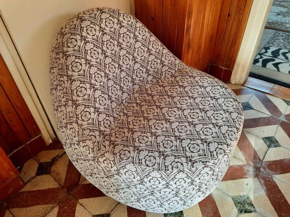 1970s vintage armchair in multicoloured patterned fabric, rounded silhouette