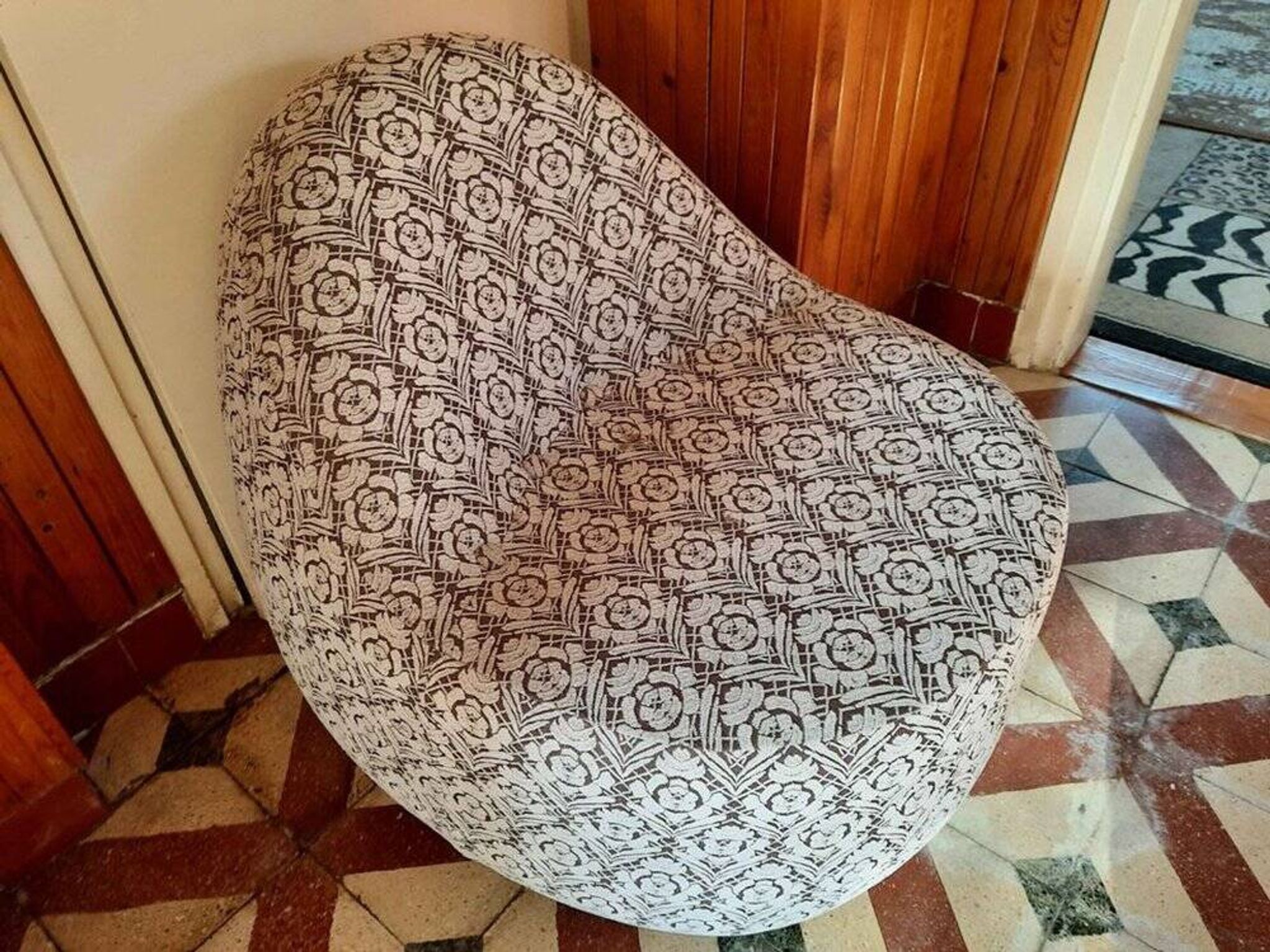 1970s vintage armchair in multicoloured patterned fabric, rounded silhouette