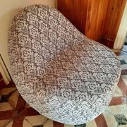 1970s vintage armchair in multicoloured patterned fabric, rounded silhouette