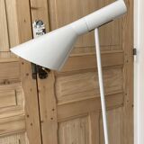 white lacquered metal reading lamp