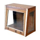 Art Deco showcase in Burmese teak