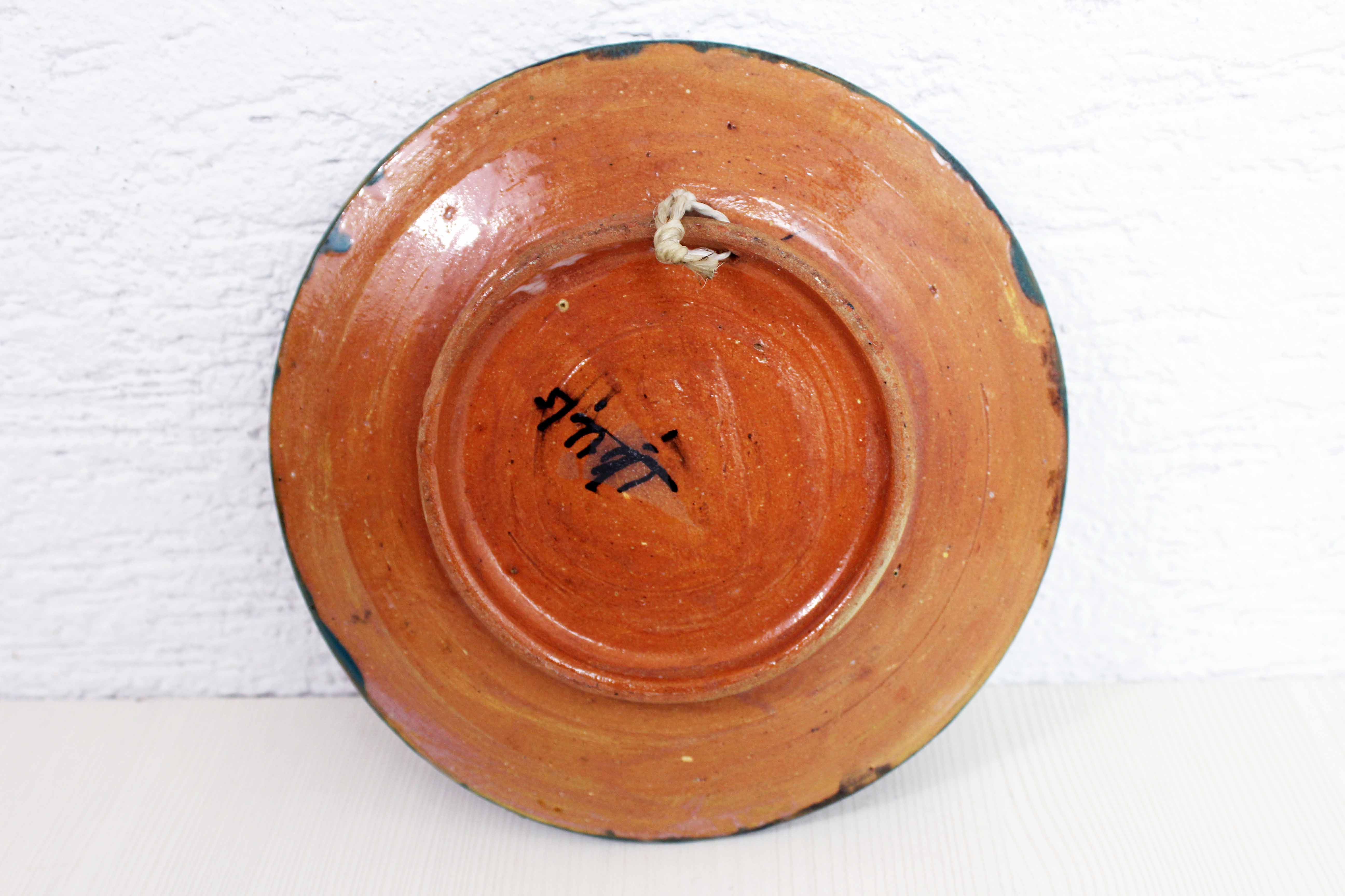 Decorative plate in sandstone 1930