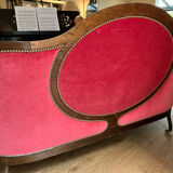 Moulded and carved wooden canapé, Napoleon III period.