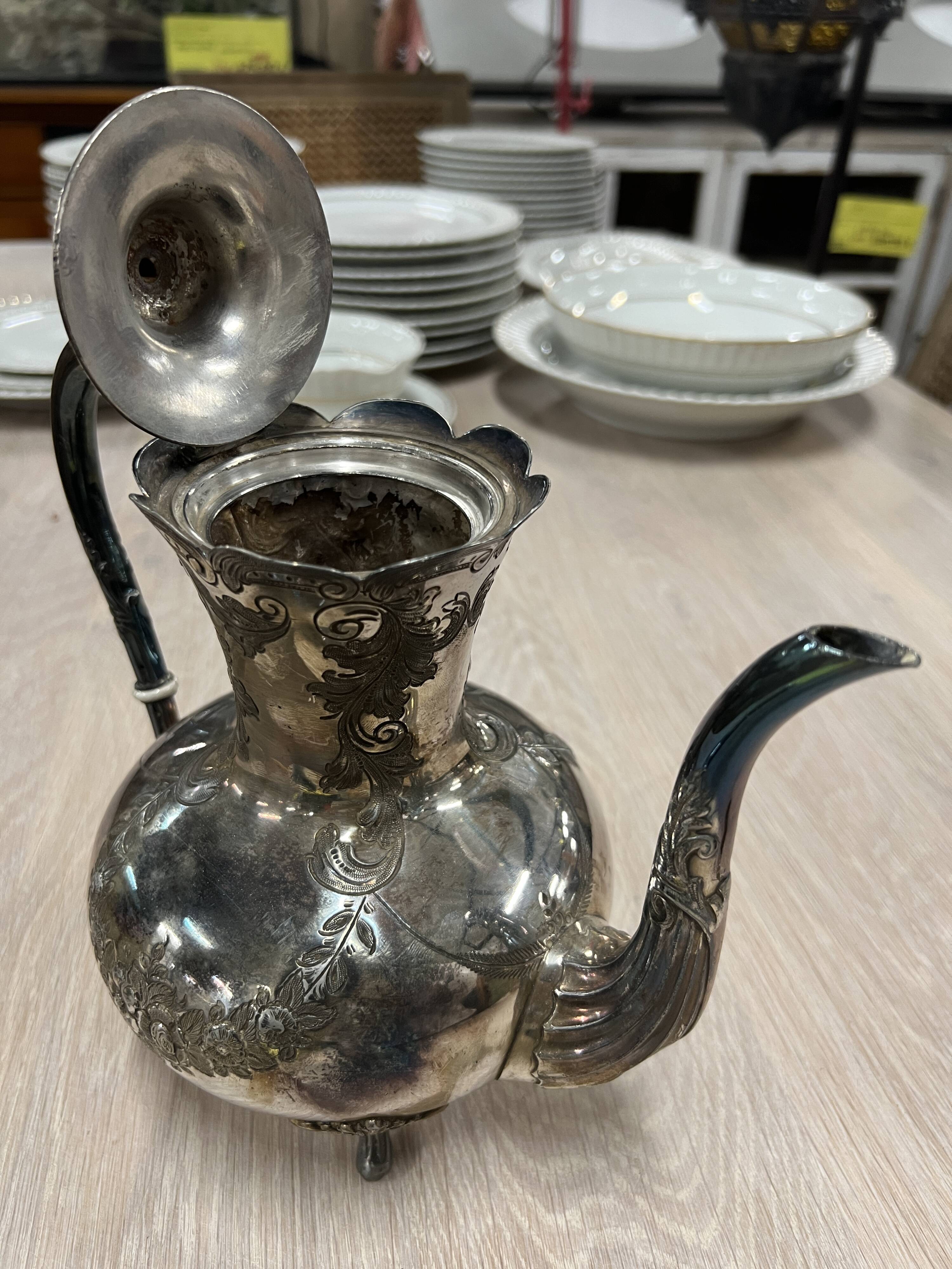 Old silver metal coffee maker